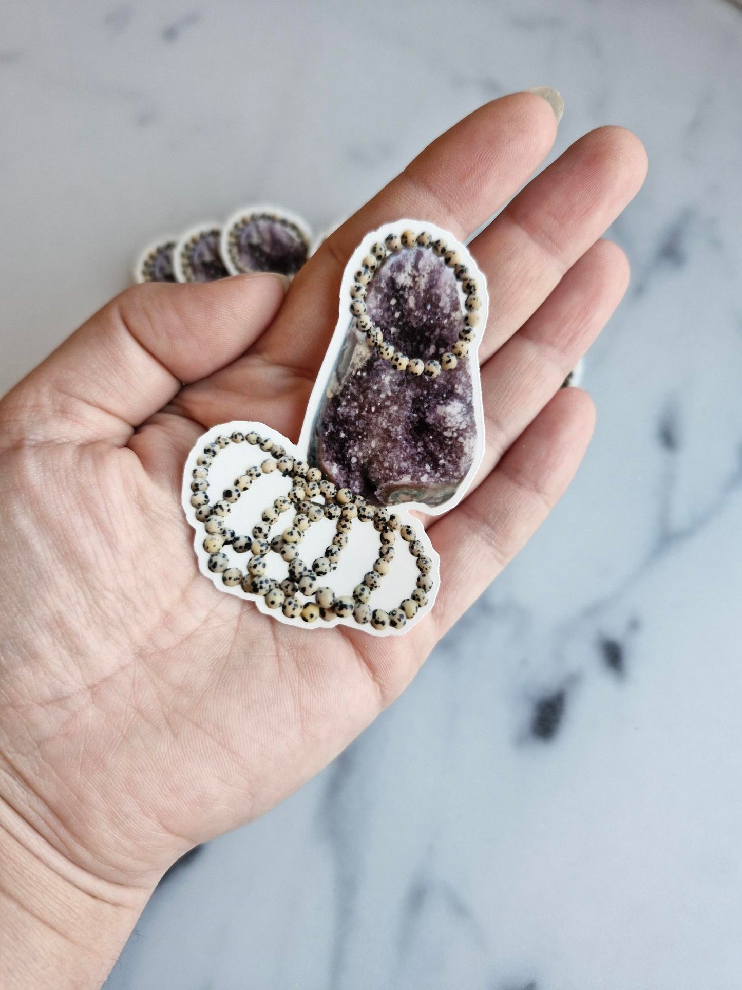 One (1) Amethyst Cut-base With Dalmatian Jasper Bracelets"-Sticker