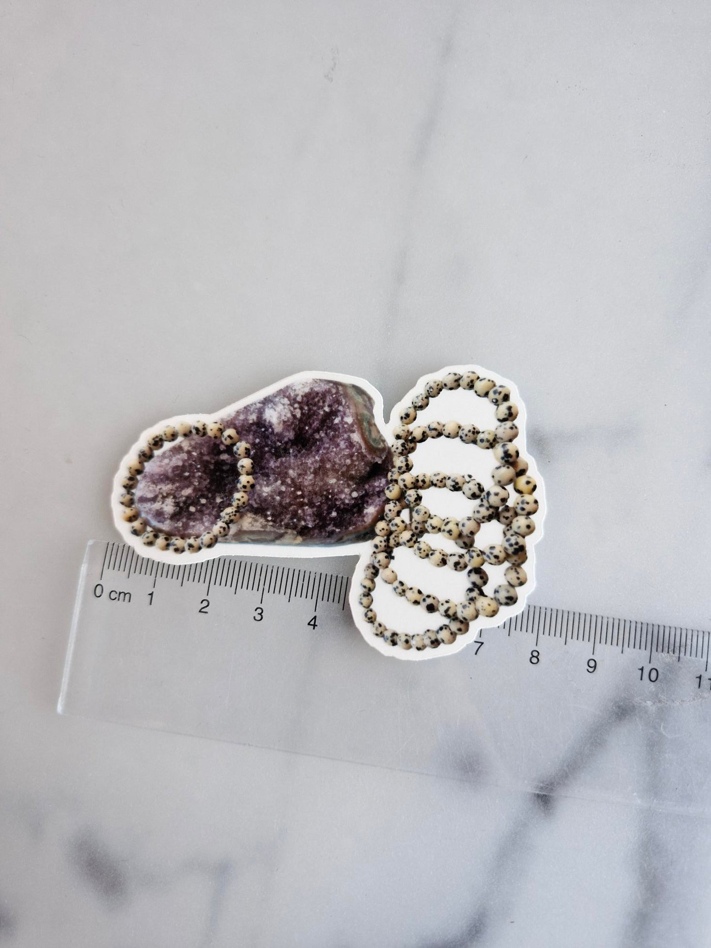 One (1) Amethyst Cut-base With Dalmatian Jasper Bracelets"-Sticker