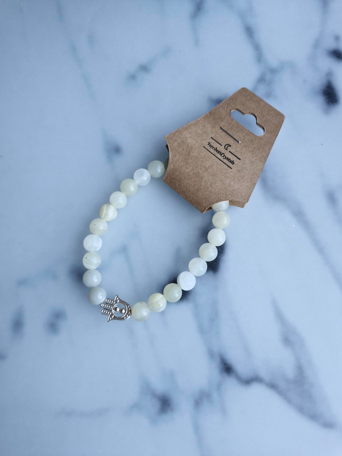 Banded Calcite Bracelet with a Hamsa Hand Charm