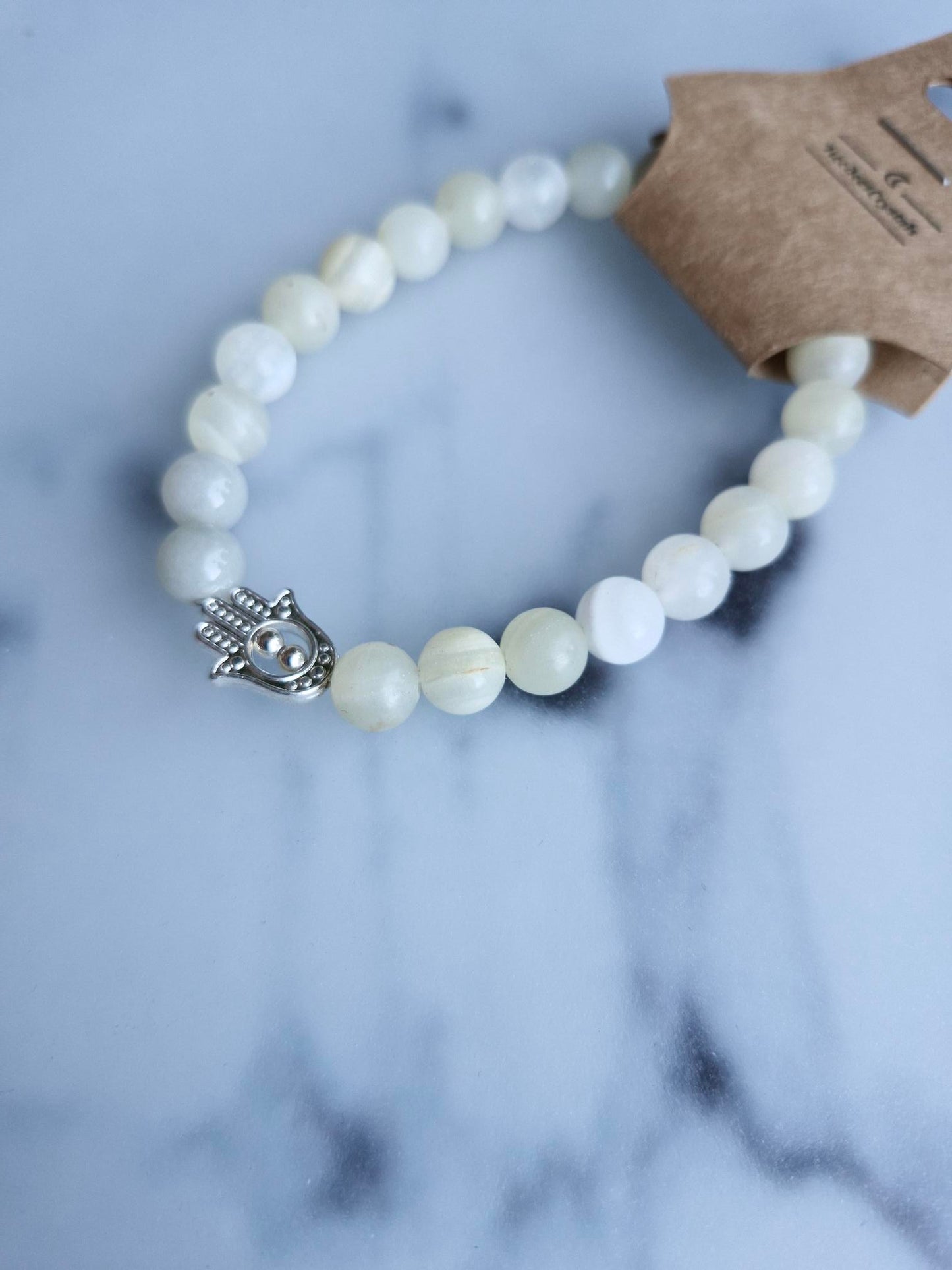 Banded Calcite Bracelet with a Hamsa Hand Charm