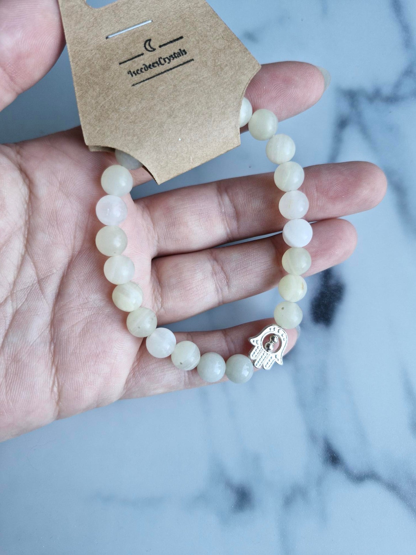 Banded Calcite Bracelet with a Hamsa Hand Charm
