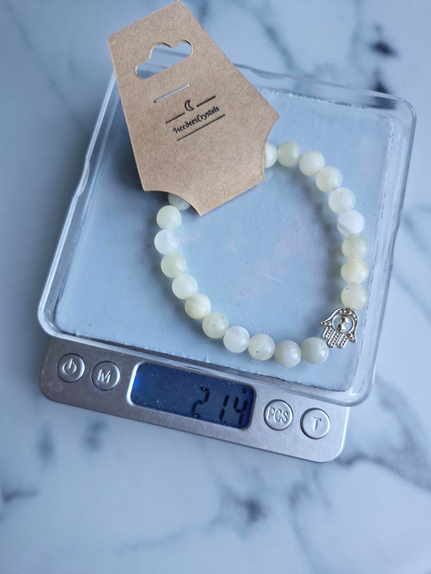 Banded Calcite Bracelet with a Hamsa Hand Charm