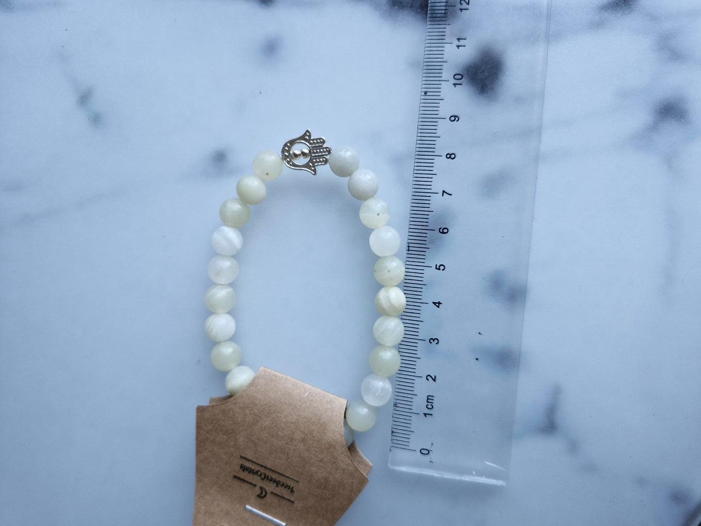 Banded Calcite Bracelet with a Hamsa Hand Charm