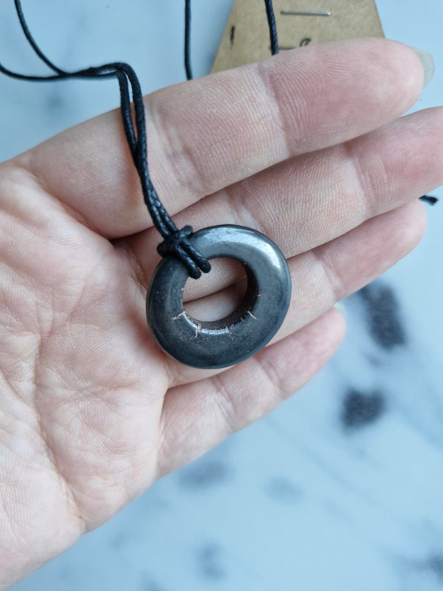 Hematite Pendant on a Faux Leather Necklace