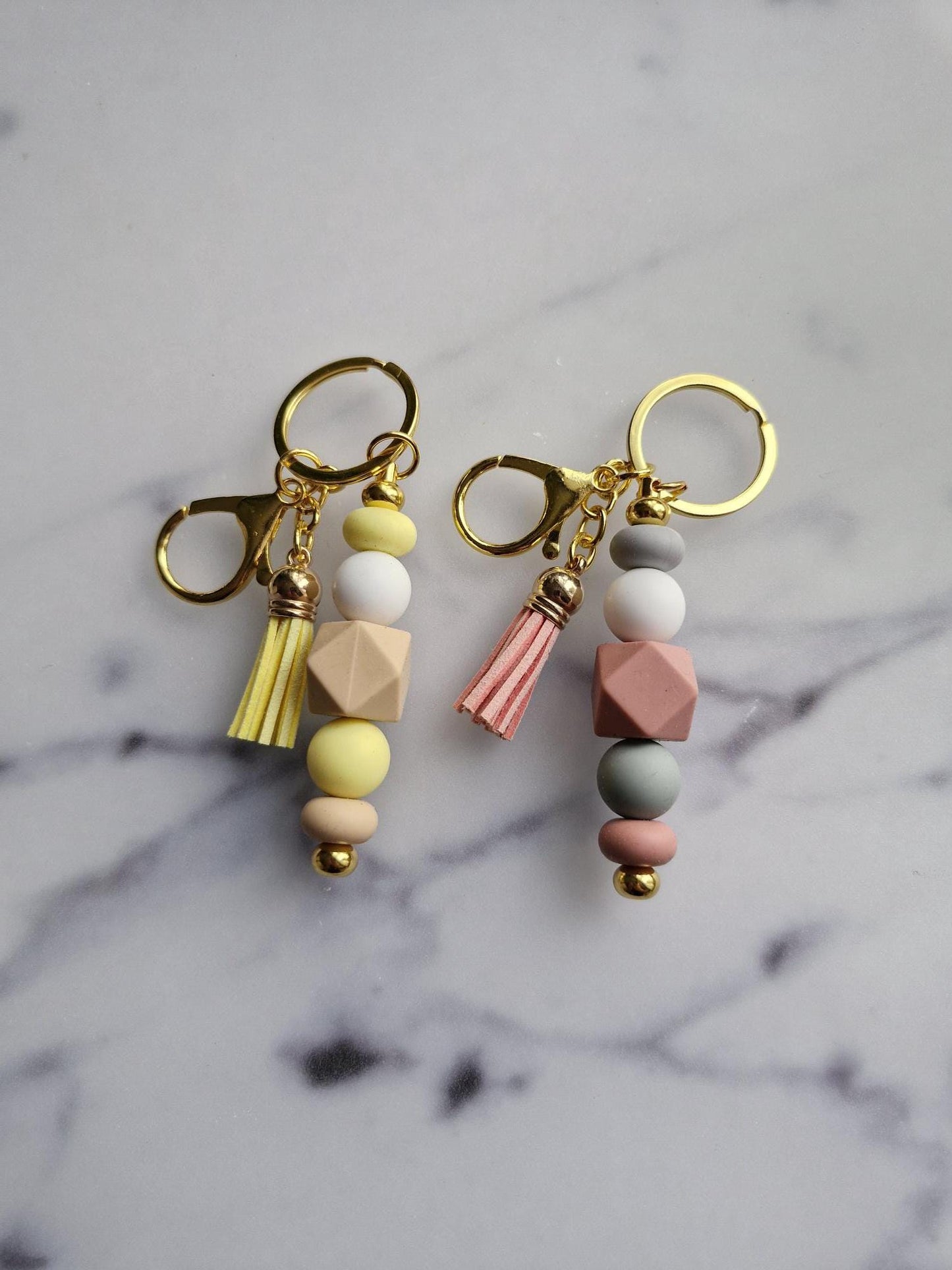 One (1) Gorgeous Unique Golden Keychain with Silicone Beads And A Tassel