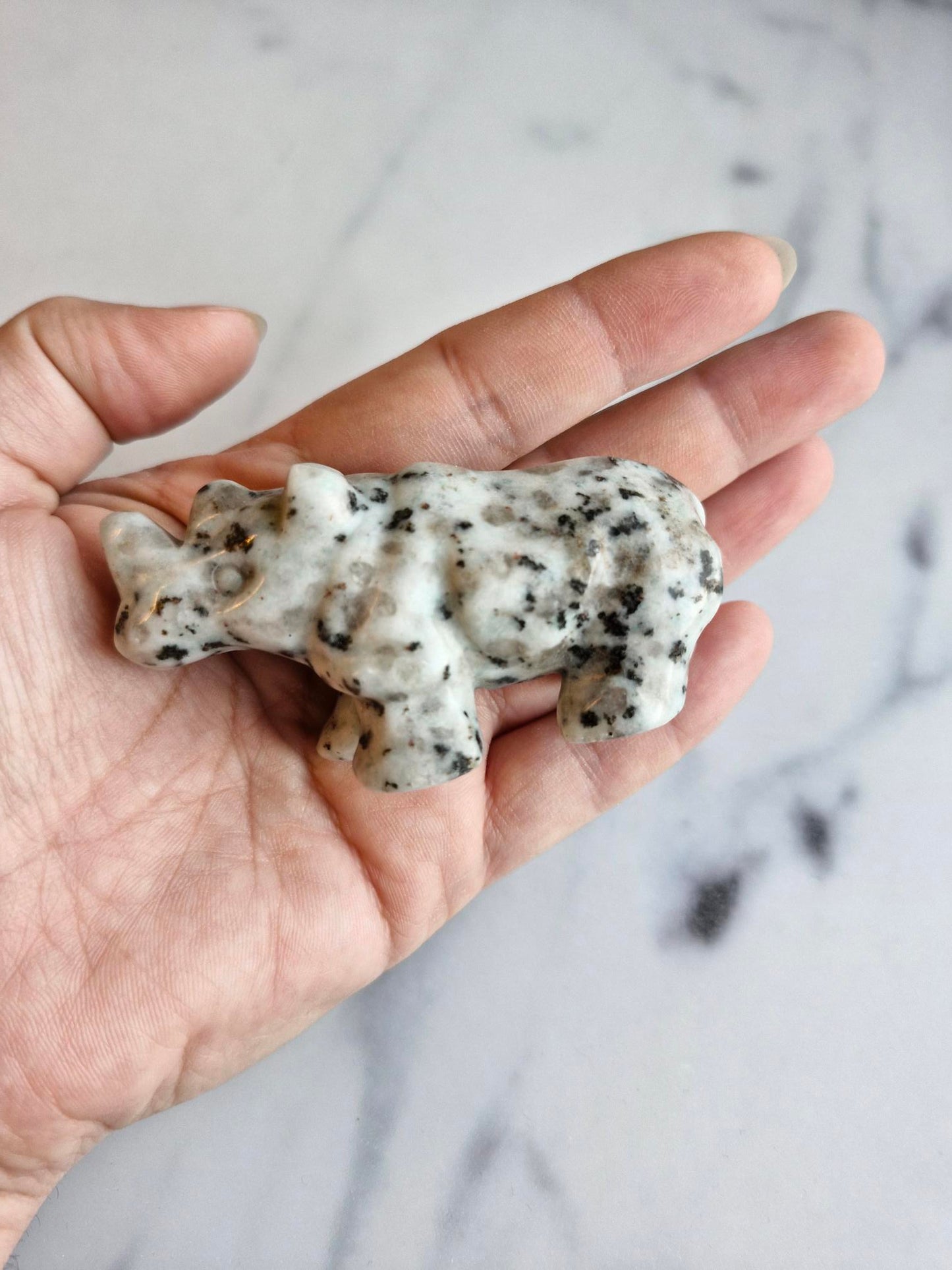 Kiwi Jasper Rhinoceros Carving With Smokey Quartz