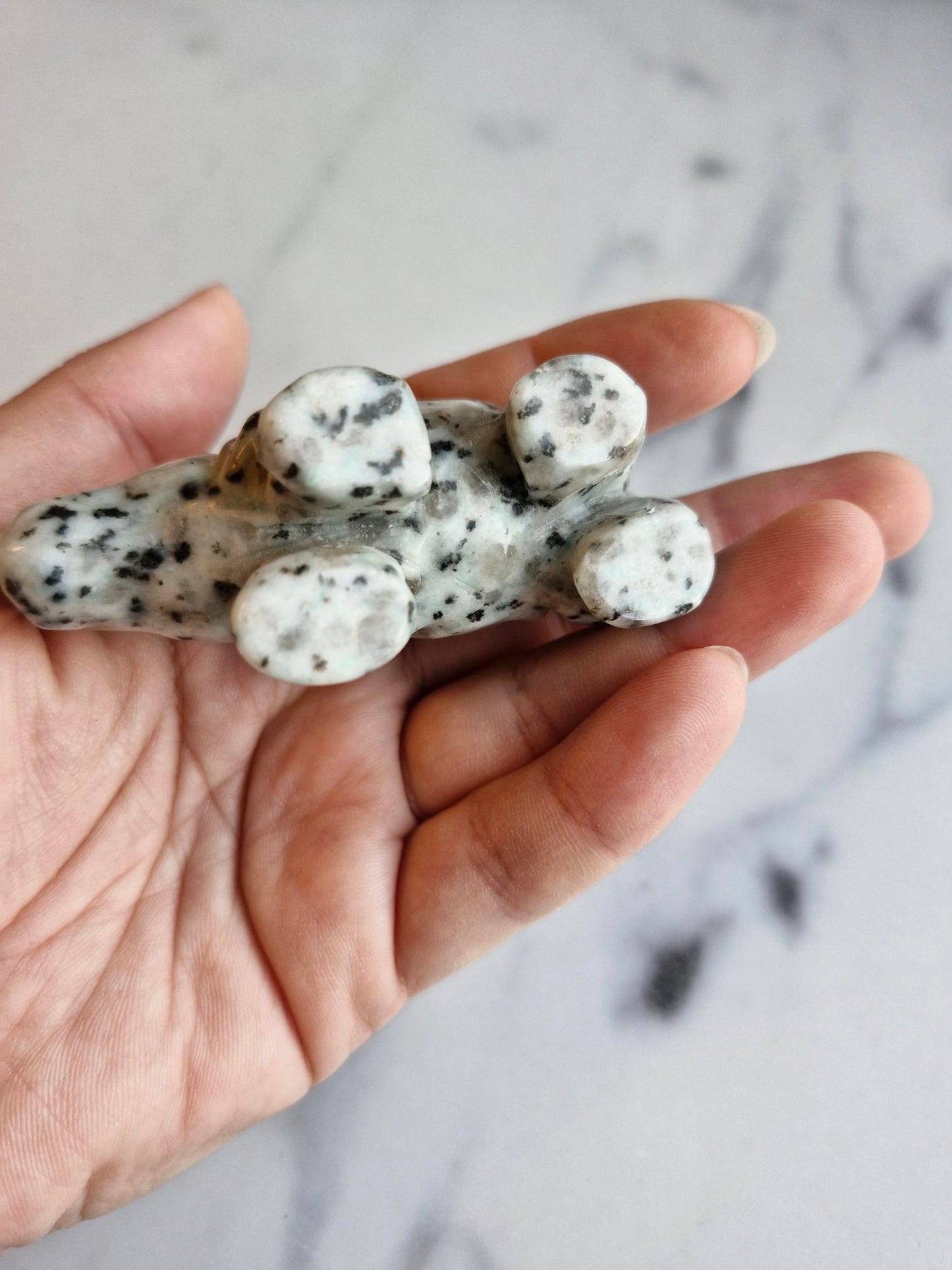 Kiwi Jasper Rhinoceros Carving With Smokey Quartz