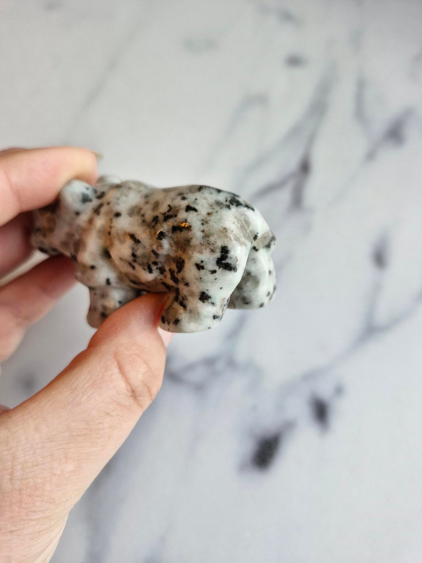 Kiwi Jasper Rhinoceros Carving With Smokey Quartz