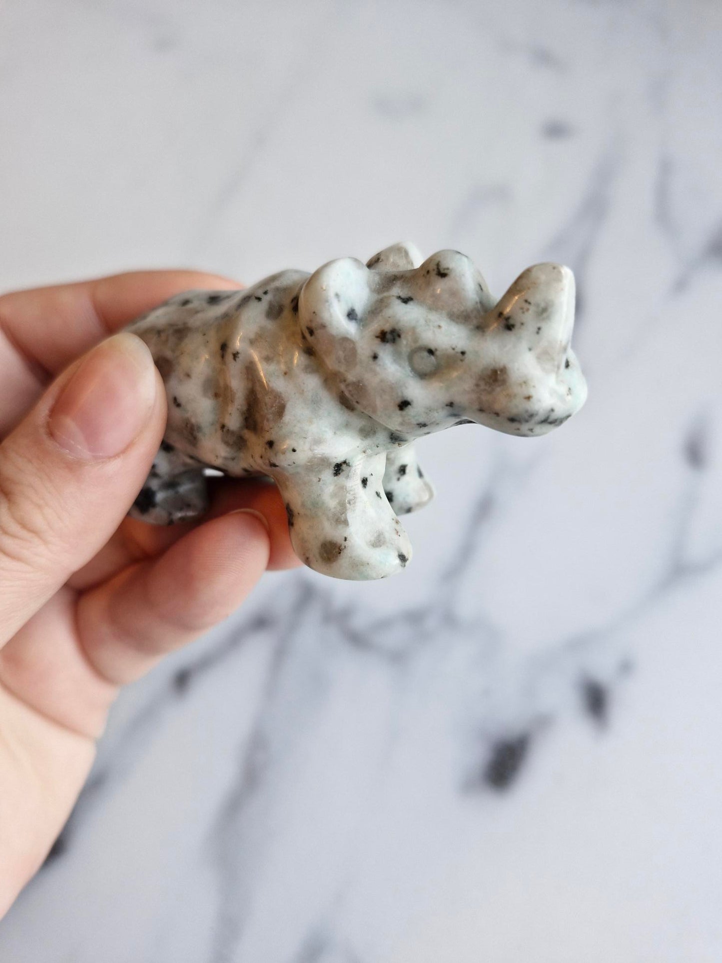 Kiwi Jasper Rhinoceros Carving With Smokey Quartz