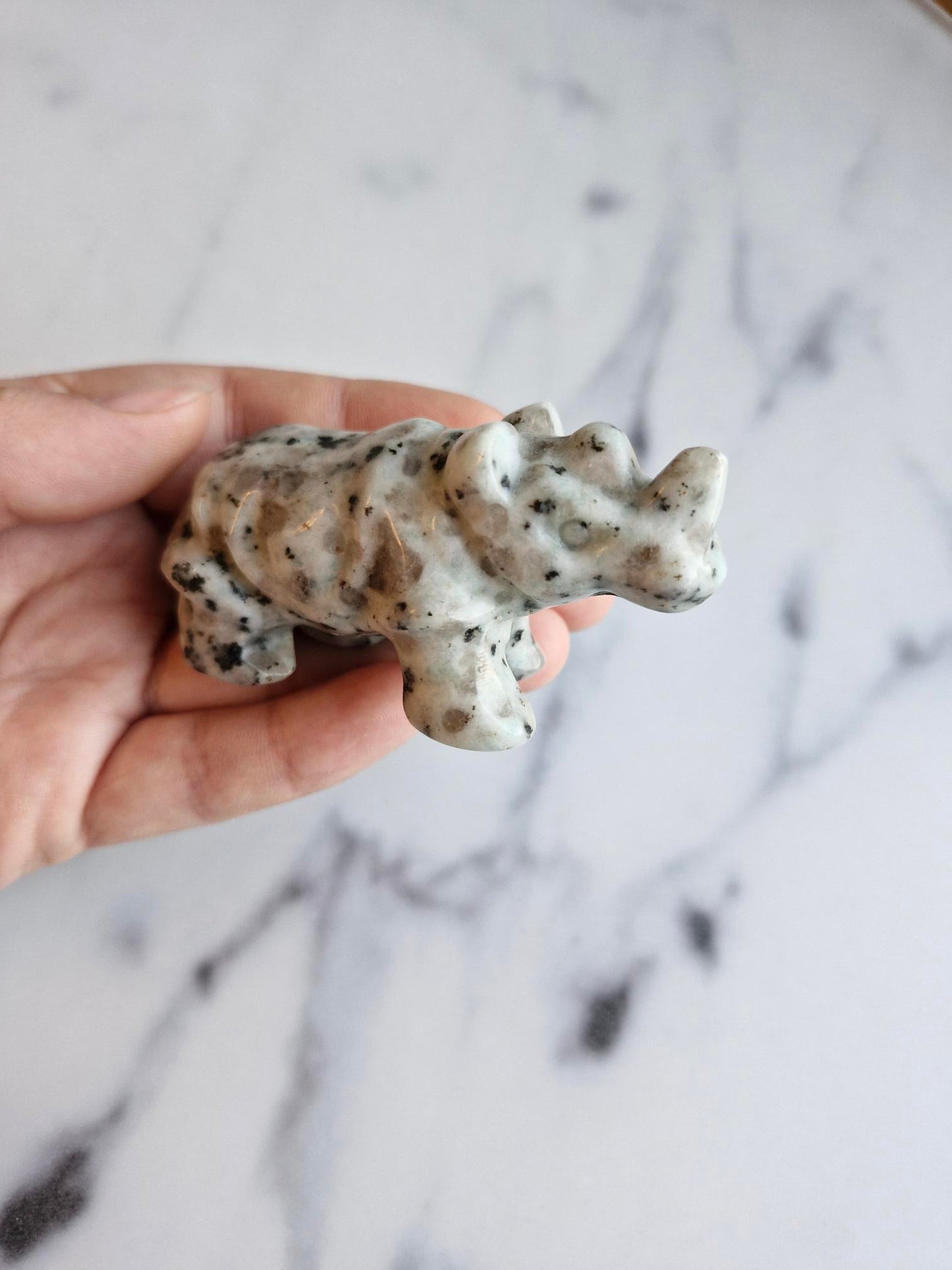 Kiwi Jasper Rhinoceros Carving With Smokey Quartz