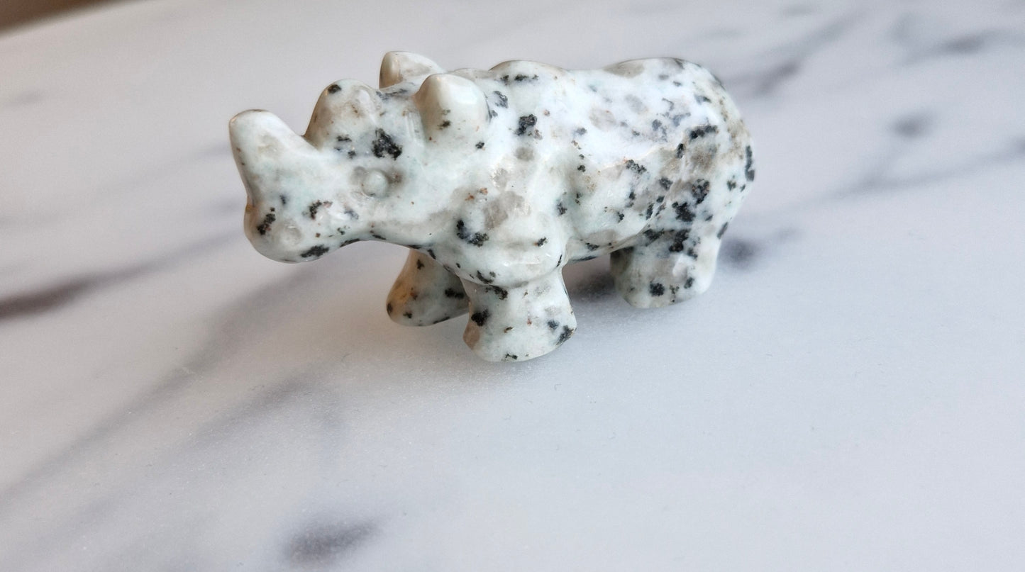 Kiwi Jasper Rhinoceros Carving With Smokey Quartz