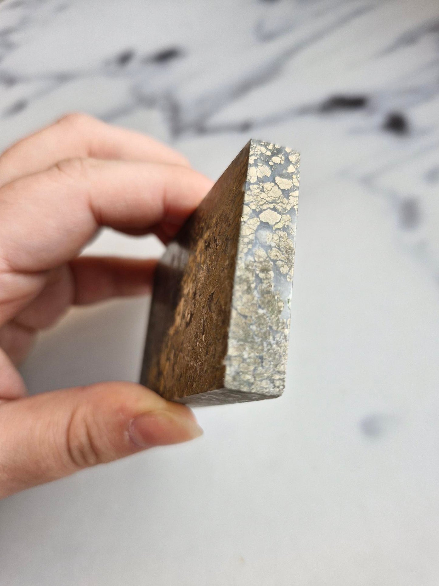Amazing slab featuring golden pyrite/marcasite with 'flower' textures and healed fractures with pale blue banded quartz infills