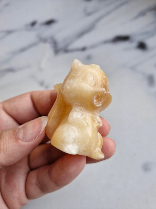 Orange Calcite Squirrel Carving