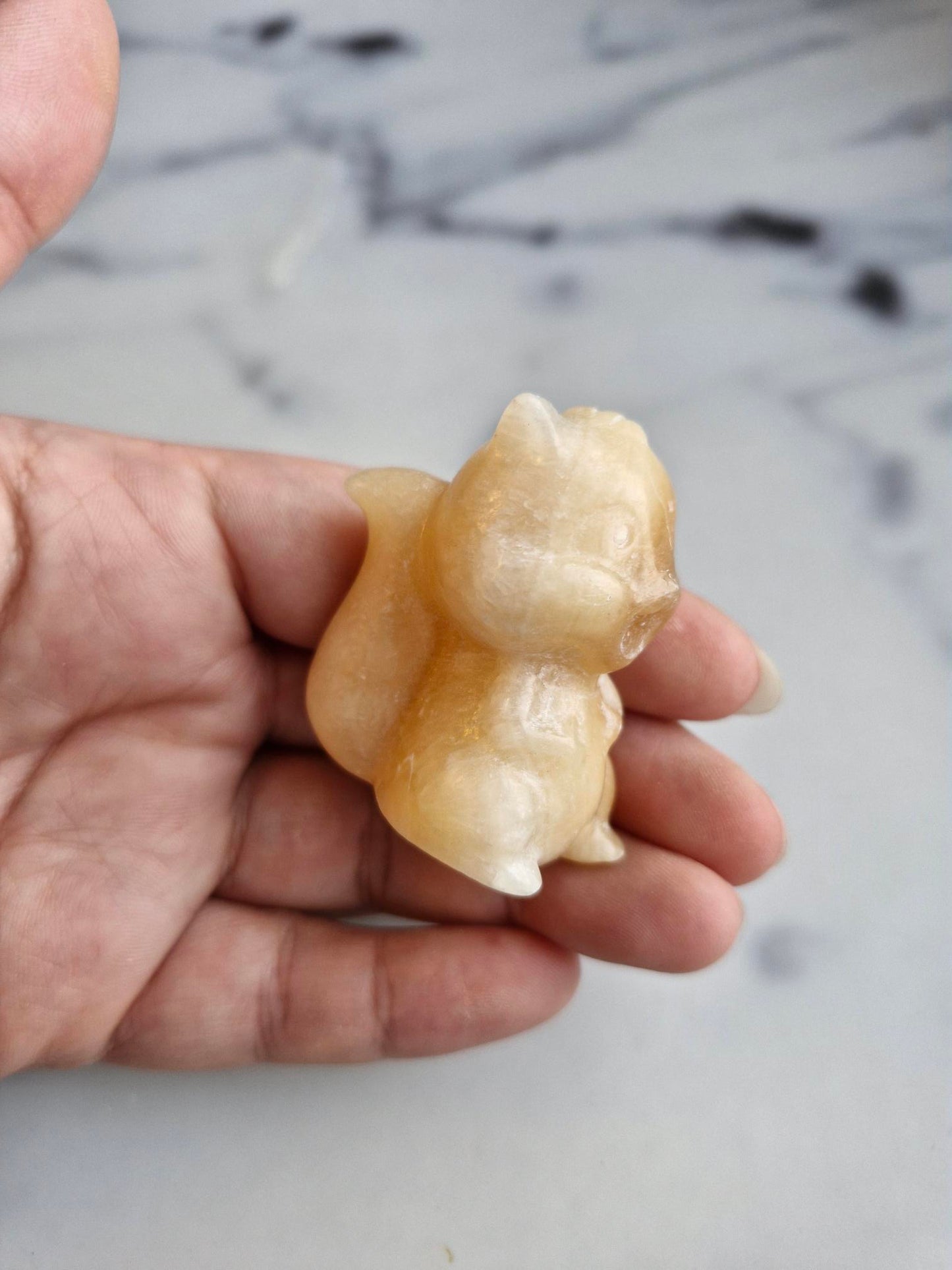 Orange Calcite Squirrel Carving
