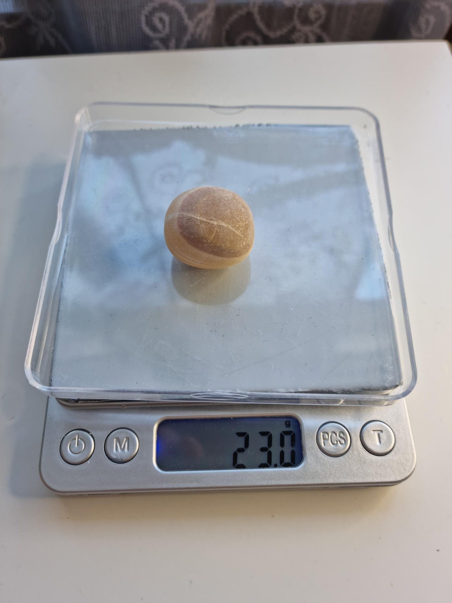 One (1) Orange Calcite Tumble