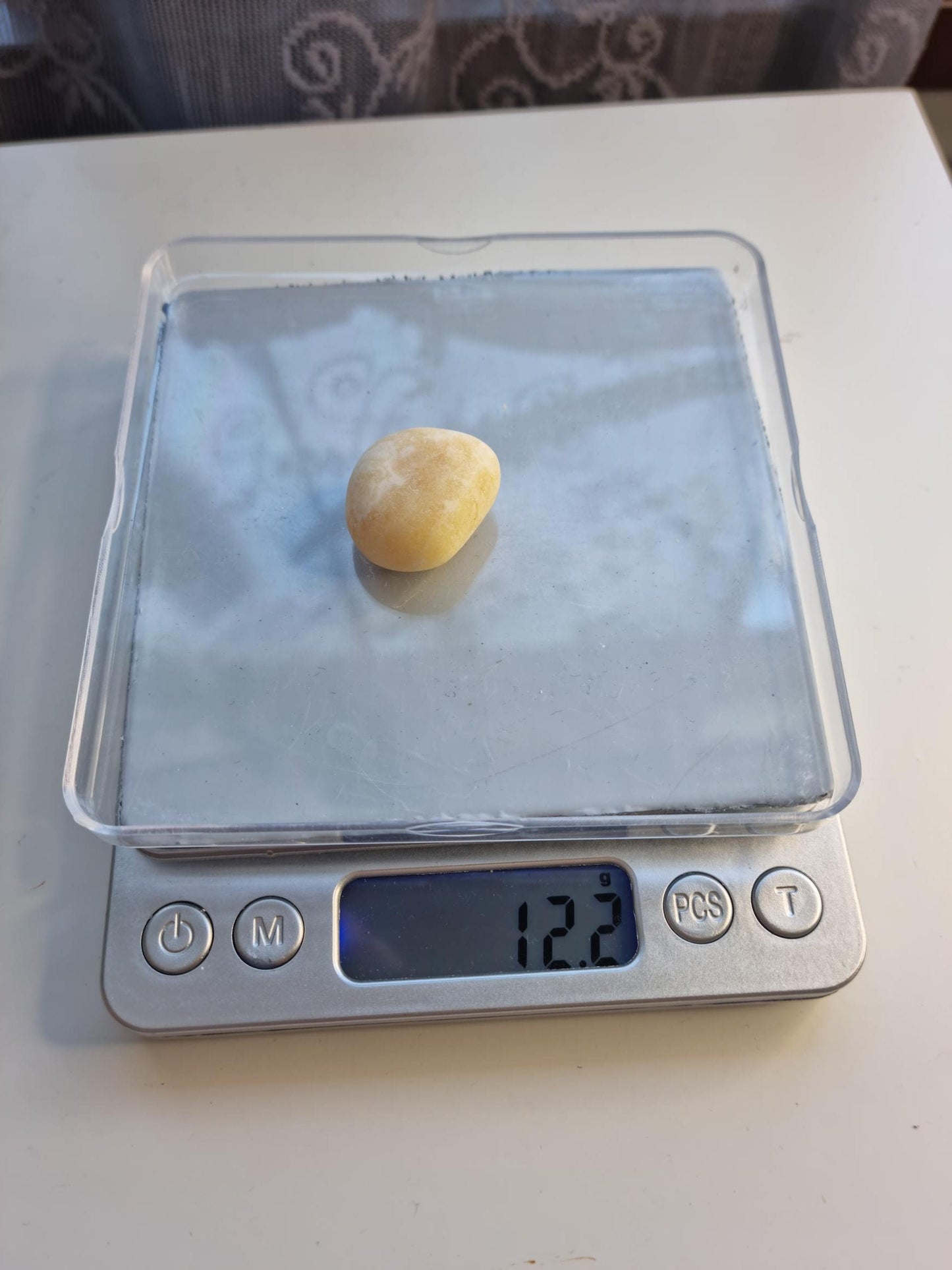 One (1) Orange Calcite Tumble