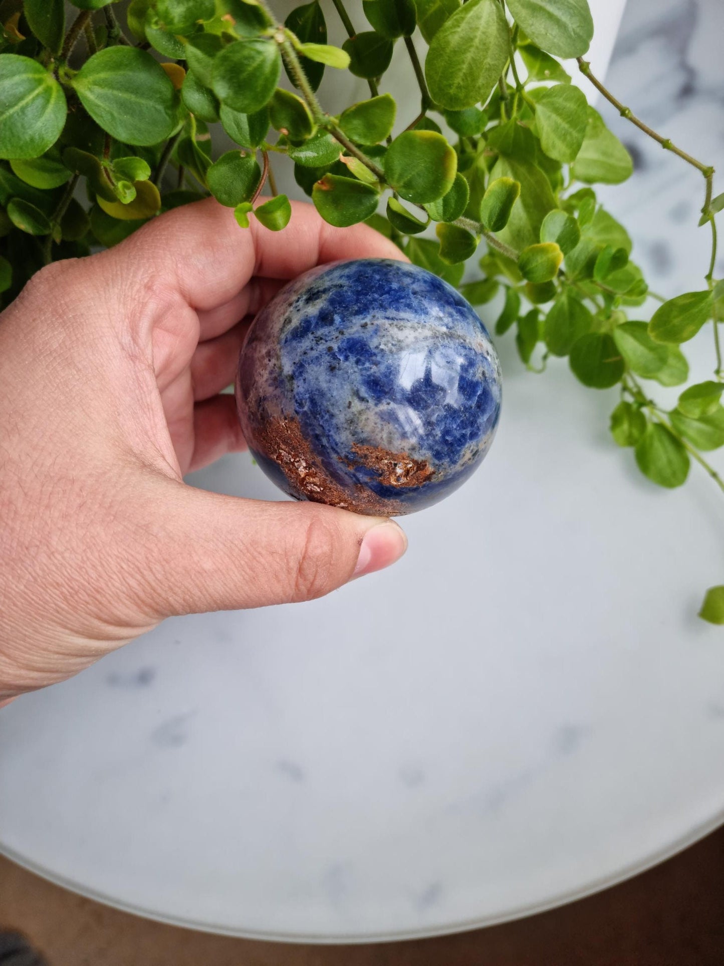 Gorgeous Sodalite Sphere with Iron Inclusions
