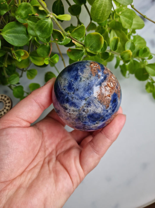 Gorgeous Sodalite Sphere with Iron Inclusions