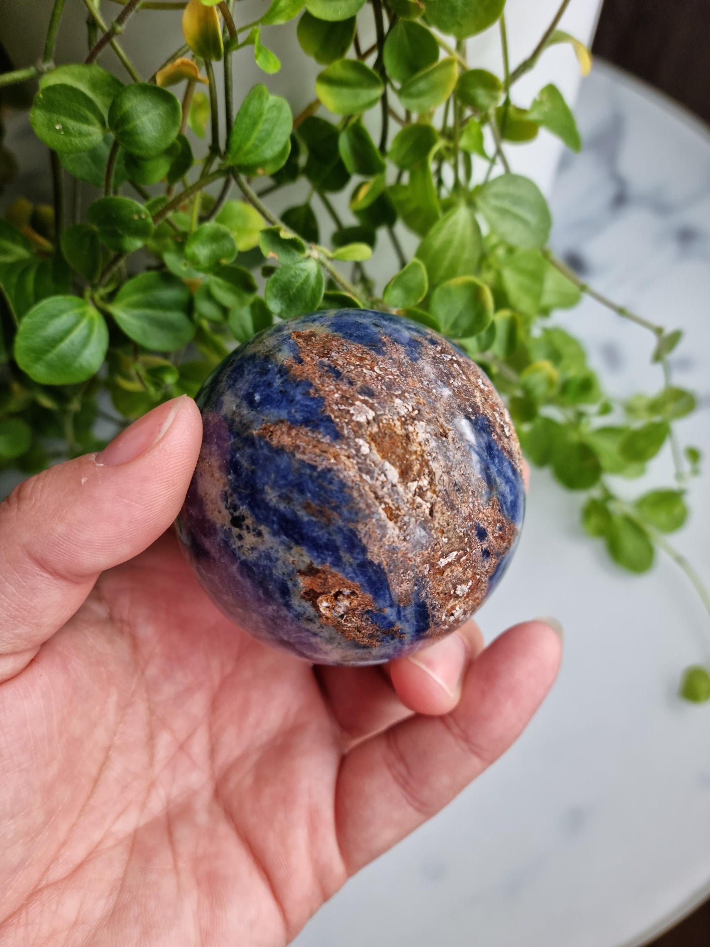 Gorgeous Sodalite Sphere with Iron Inclusions