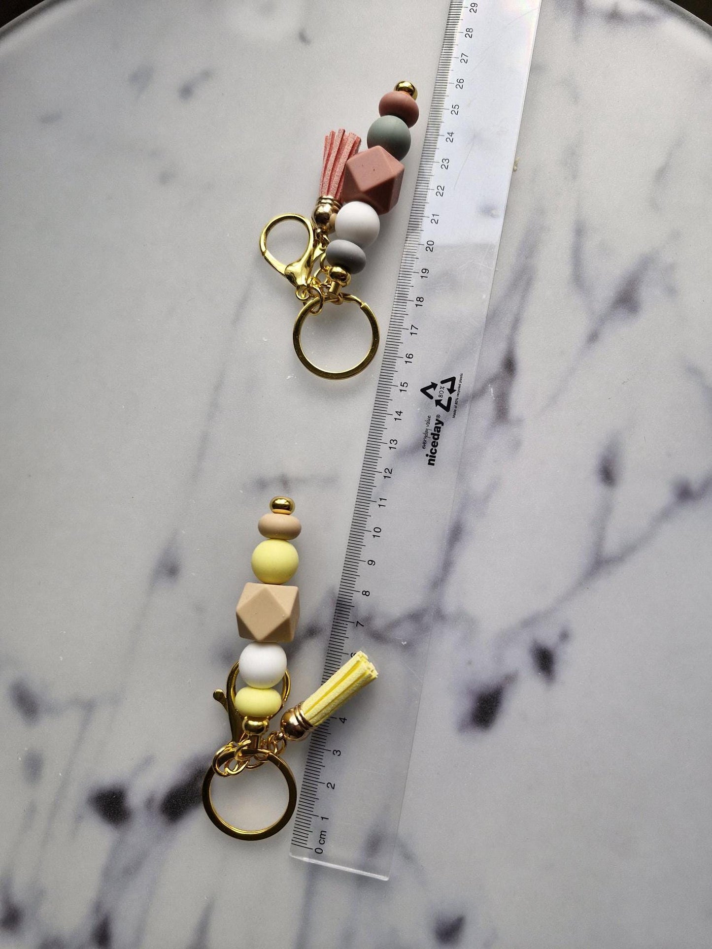 One (1) Gorgeous Unique Golden Keychain with Silicone Beads And A Tassel