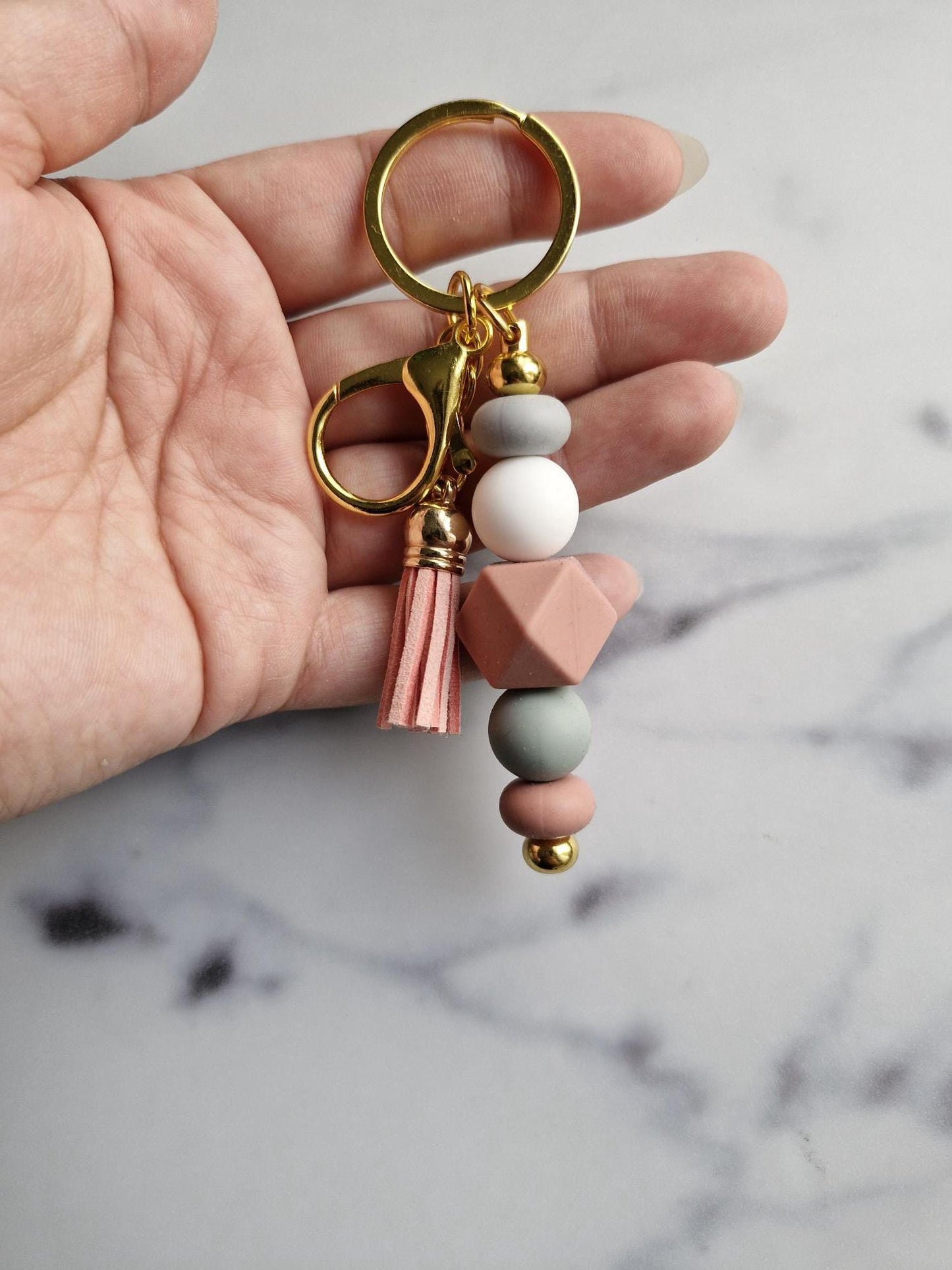 One (1) Gorgeous Unique Golden Keychain with Silicone Beads And A Tassel